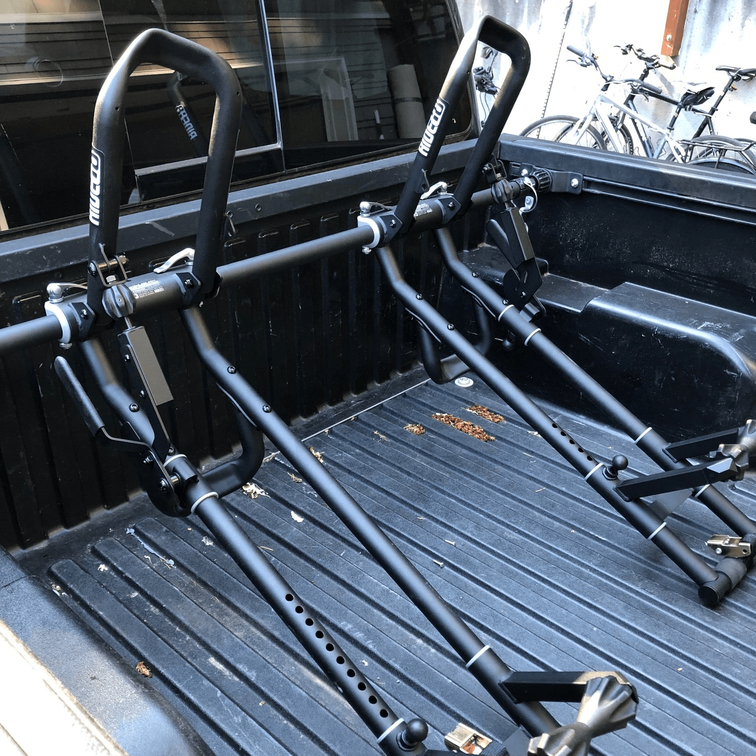 QR3 Bike Rack for Toyota Tacoma mounted in the bed of the truck.
