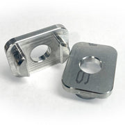 Two custom aluminum inserts used to mount a Telescopic Crossbar to a Chevy or GMC truck bed.