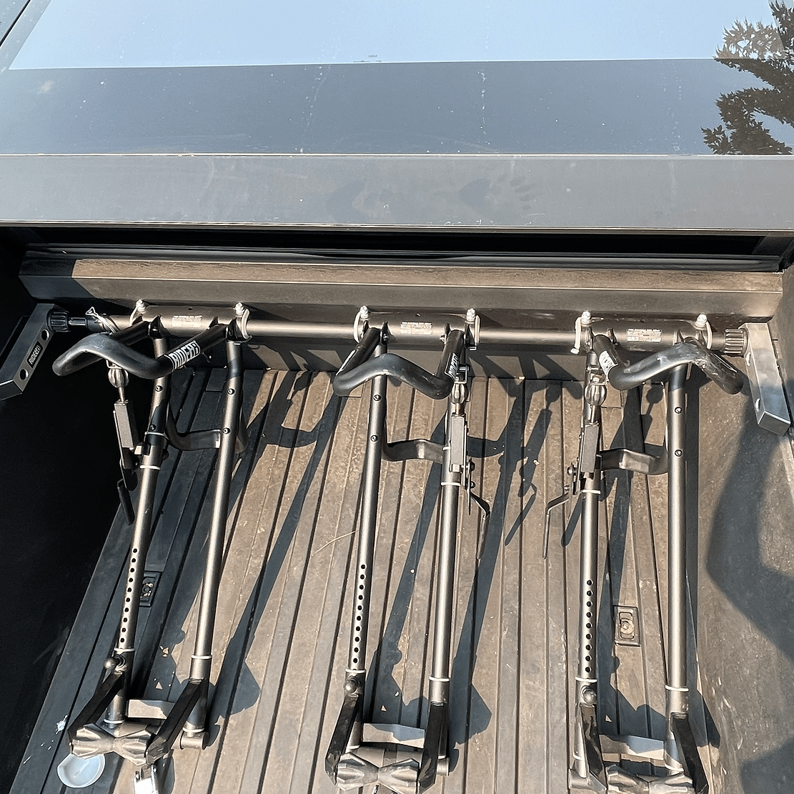 Three RIDE88 QR3 Bike Racks mounted in a truck bed using RIDE88 QR3 bike racks for Cybertruck.

Tesla Cybertruck QR3