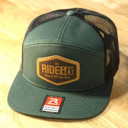 RIDE88 green and black trucker hat with brown leather patch logo reading “RIDE88 Ultimate Truck Bike Racks,” featuring flat bill and mesh back design.