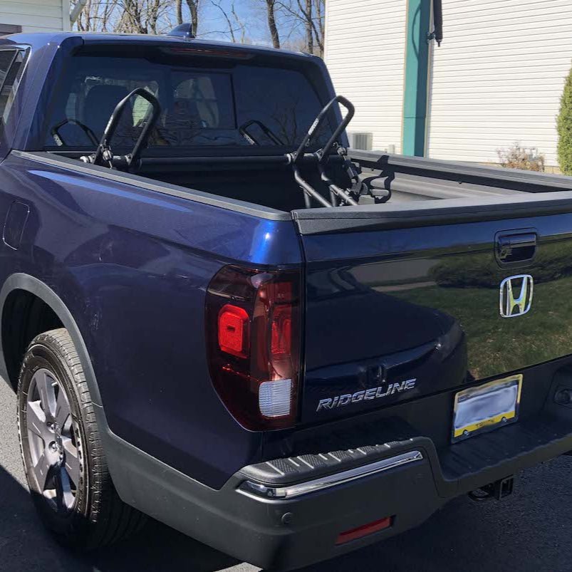 Two RIDE88 QR3 Bike Racks mounted in the truck bed using QR3 bike racks for Honda Ridgeline.