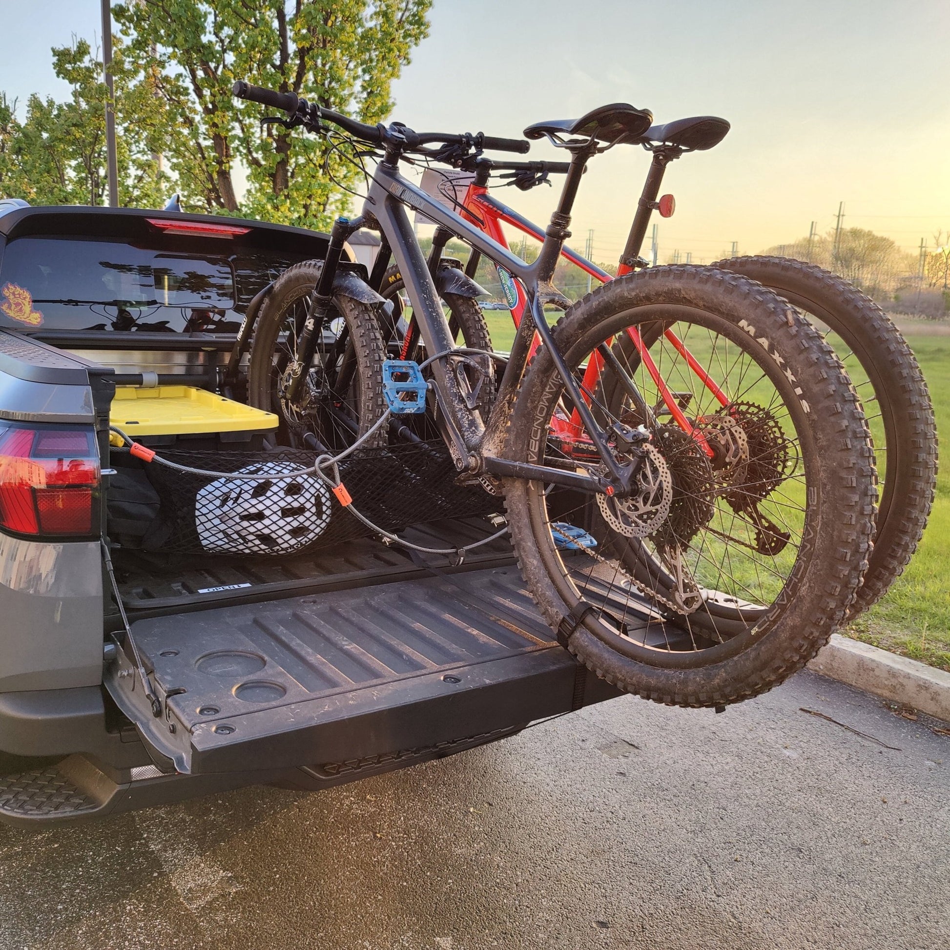 Two bicycles mounted to the truck bed using QR3 Bike Racks for Hyundai Santa Cruz.