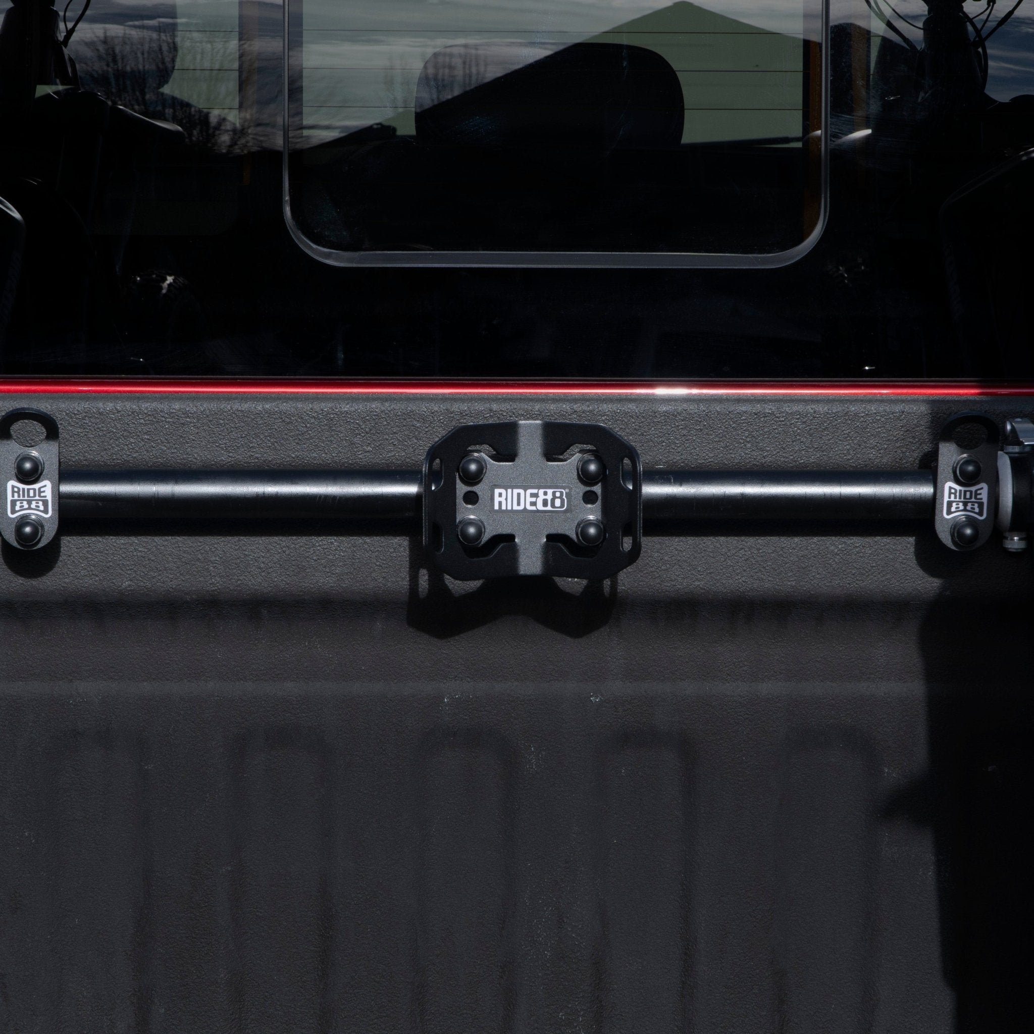 RIDE88 Plus One Kit mounted to a crossbar in a truck bed.