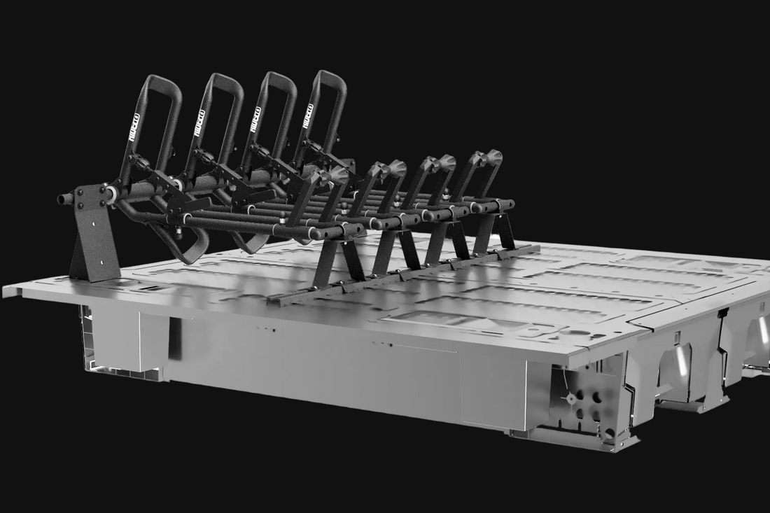 Four RIDE88 QR3 Bike Racks mounted on top of a DECKED Box System.