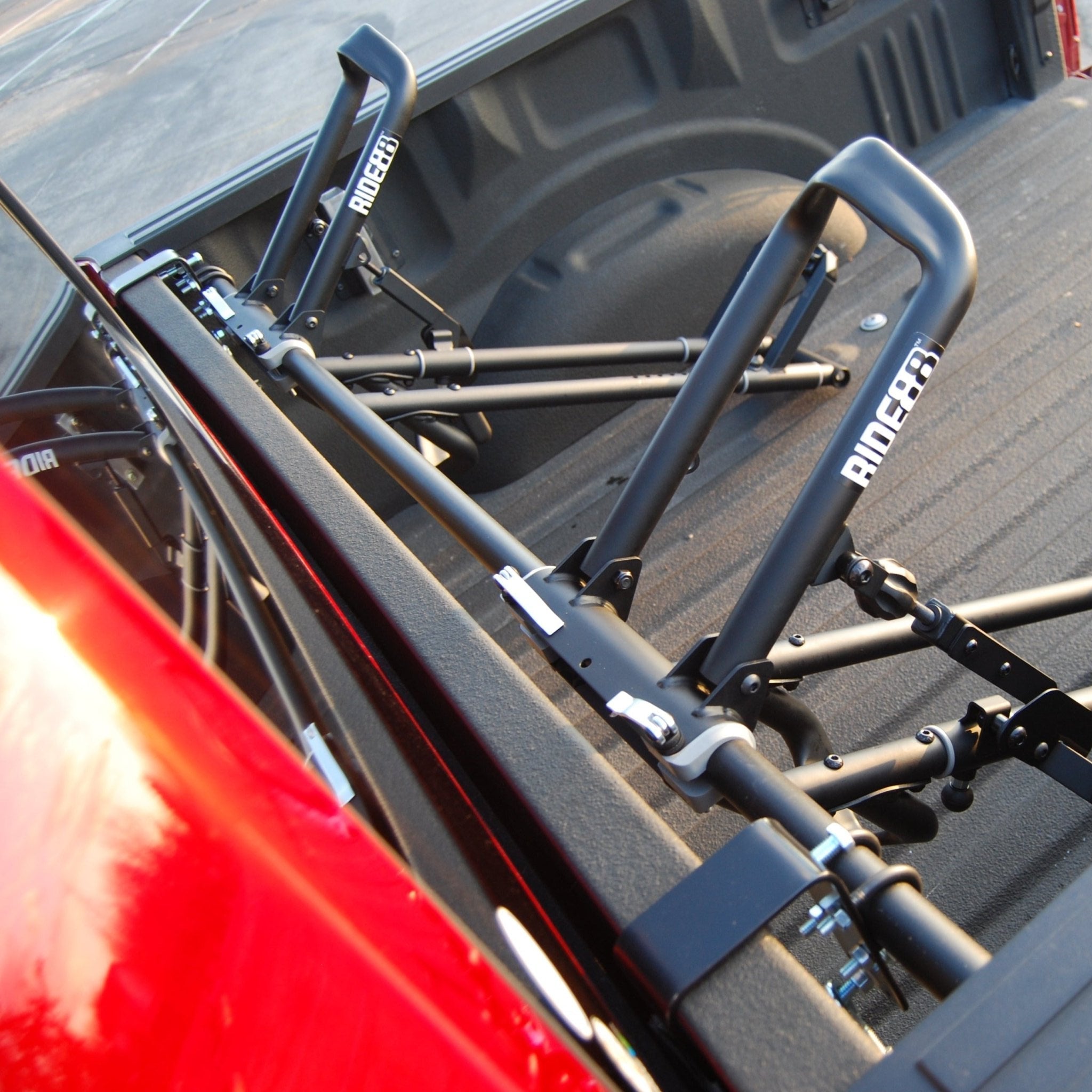 Two RIDE88 QR3 Bike Racks mounted in a pickup truck bed using the Hanger Crossbar.