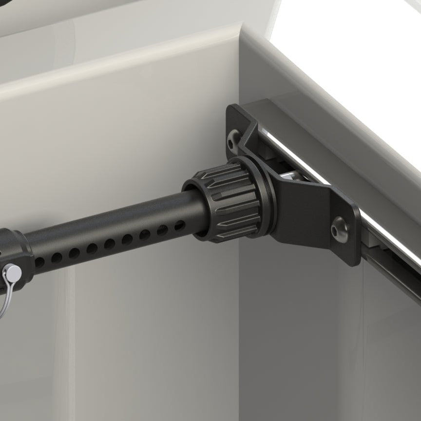 RIDE88 Telescopic Crossbar mounted to a pickup truck’s OEM factory bed rail utility track using side brackets.