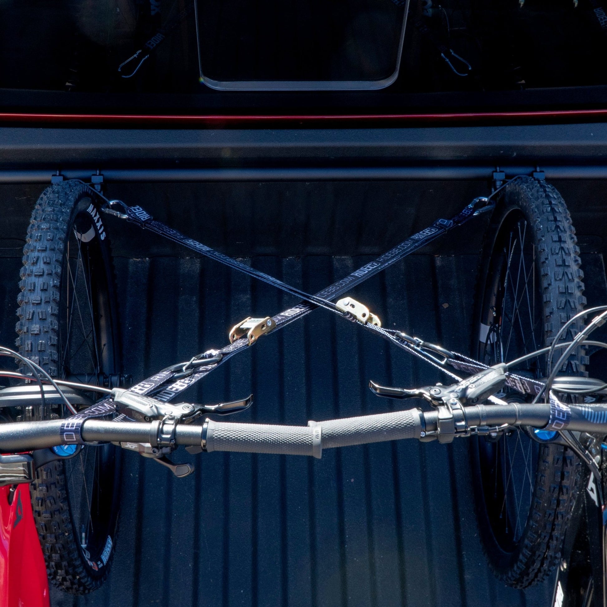 Two bikes mounted in a Ford F150 truck bed using the RIDE88 Cinch Rack