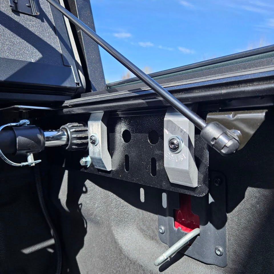 RIDE88 Universal Plate Adapter mounted to a truck bed, used to mount the telescopic crossbar for a universal truck bed bike rack.