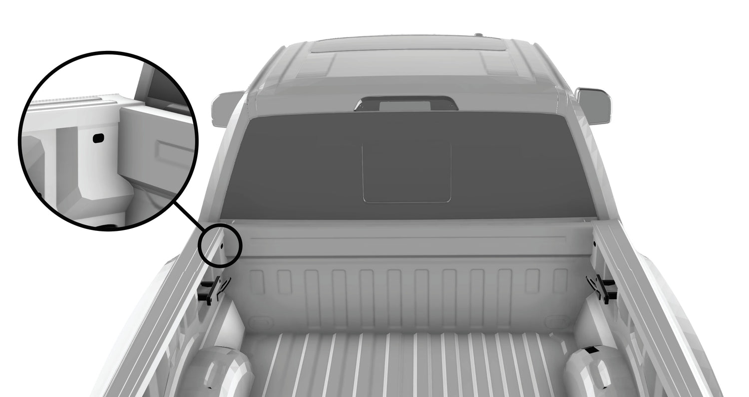 Pickup truck bed showing hole location for installing the RIDE88 telescopic crossbar mounting point.