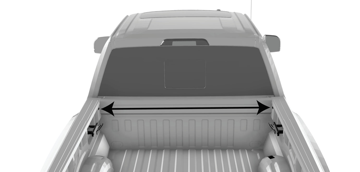 Pickup truck bed with arrows showing where to measure for installing the RIDE88 telescopic crossbar.