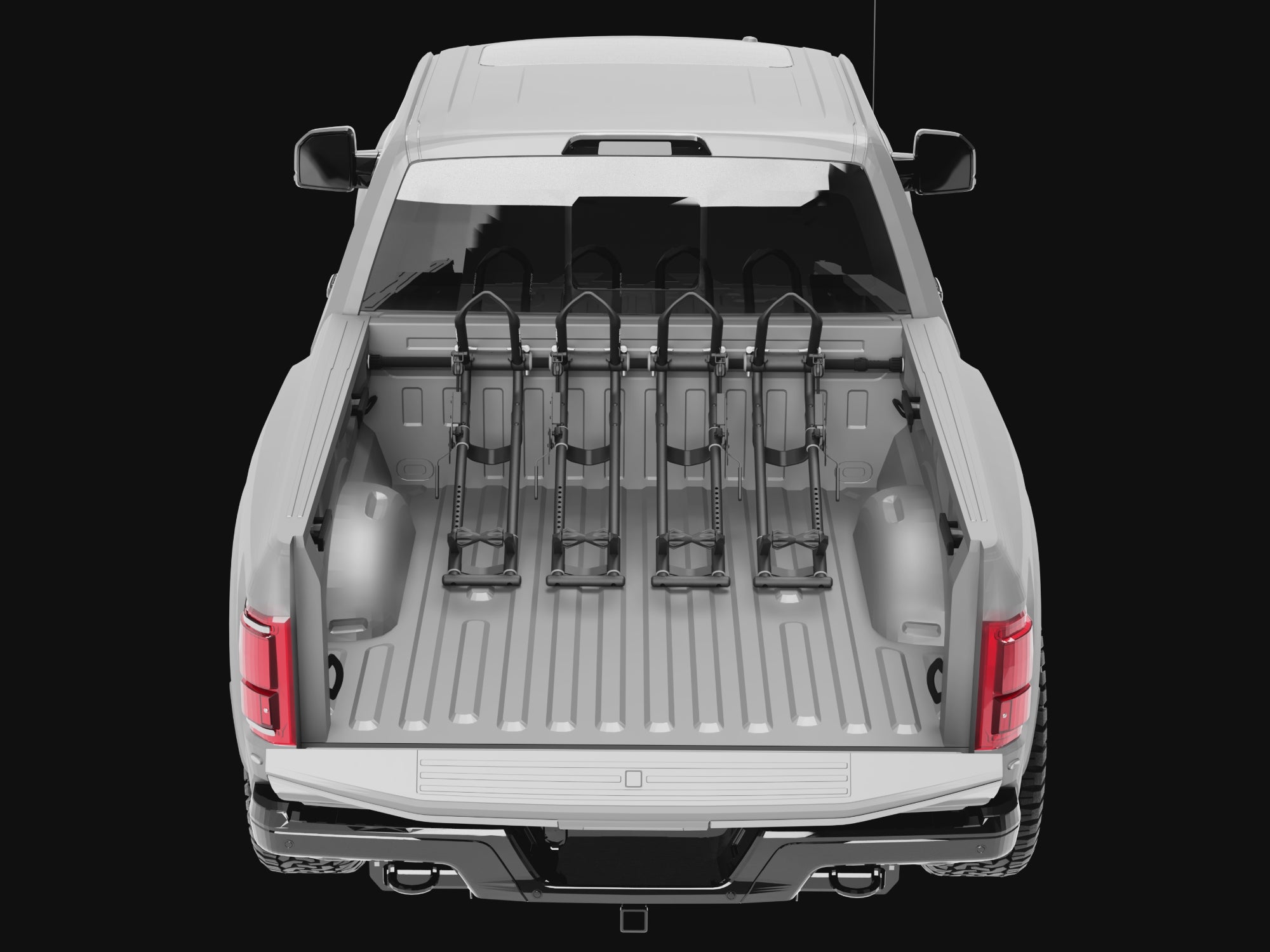 Load video: A truck bed showing multiple QR3 bike racks being added and their ability to move left to right for best placement.